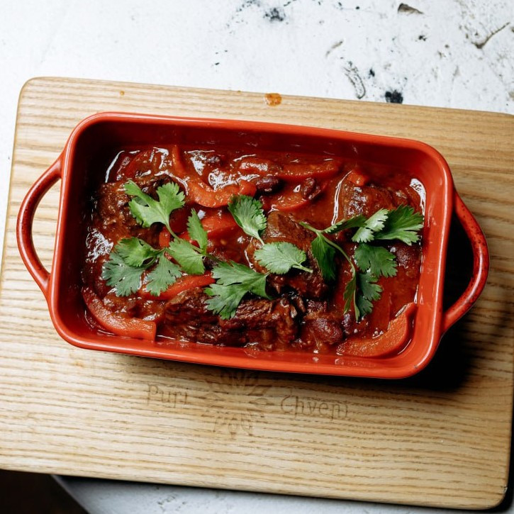 Chashushuli with beef stewed in tomato spicy sauce with onion, basil and cilantro
