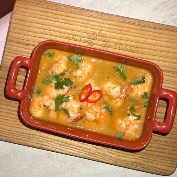 Shrimp chakapuli in tangerine chili sauce