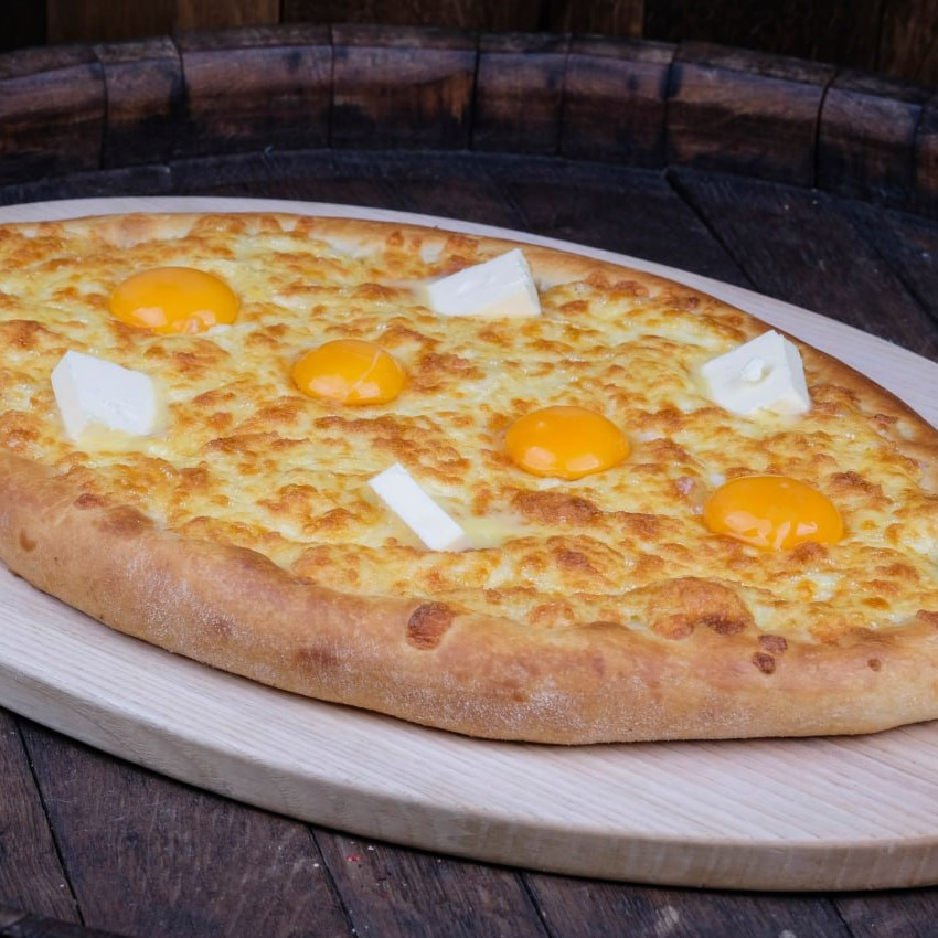 Big khachapuri in adzharian style "Titanic"